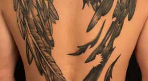 Tatouage-homme-realiste-ange-demon-graphicaderme-tattoo