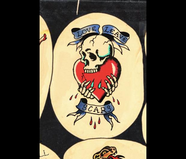 Tatouage traditionnel d'un crâne Love Leave Scars par Tamara Chaudesaigues au Graphicaderme Avignon.