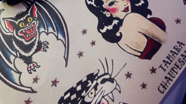 Planche de flashs de tatouage old school avec pin-up et motifs traditionnels américains, dessinée par Tamara Chaudesaigues chez Graphicaderme, studio de tatouage à Avignon
